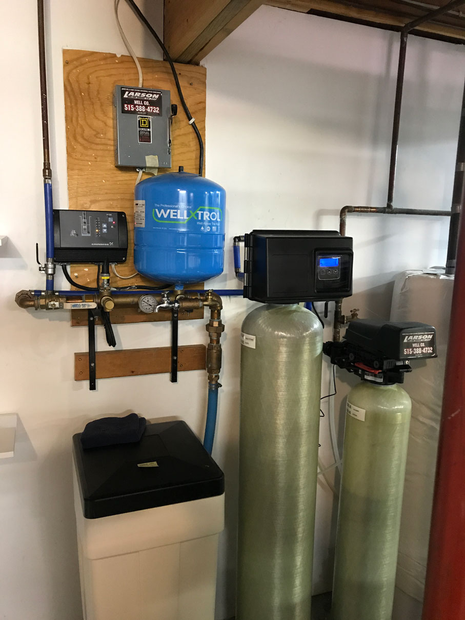 Colored photo of water softener, iron filter and buffer tank